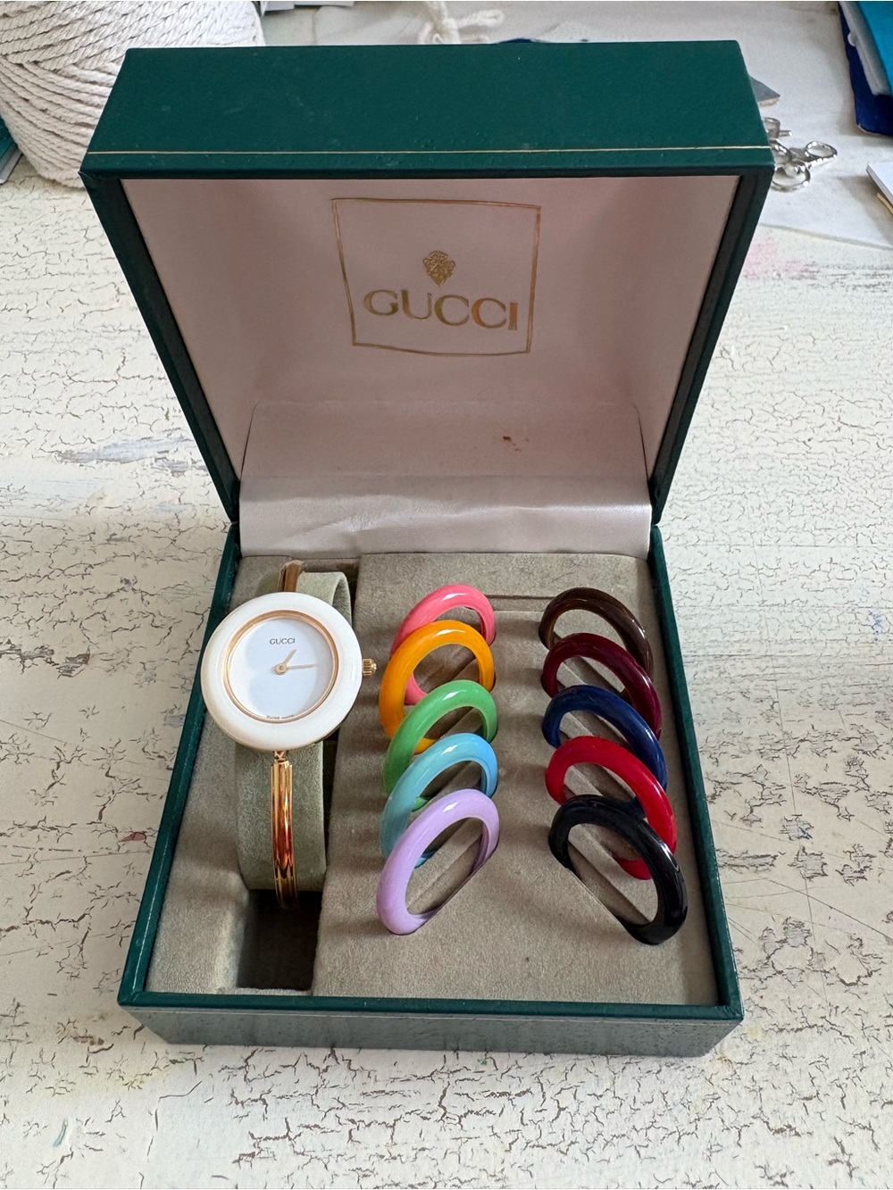 Gucci Gold-Tone Bangle Watch with Interchangeable Multicolor Rings